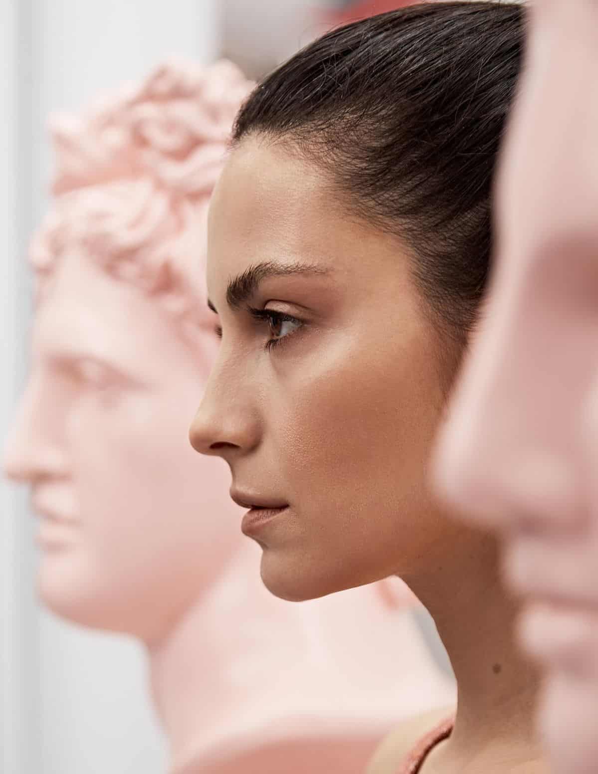 Experienced practitioner executing precise clinical non-surgical nose reshape profile mapping